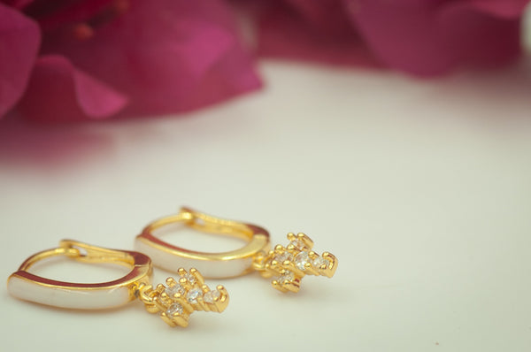 TIRONA - DANGLING CROSS EARRING