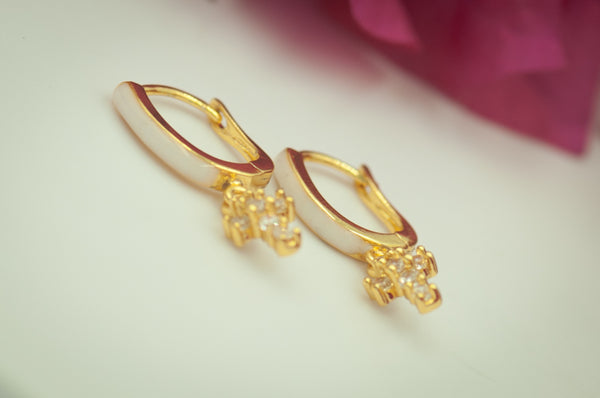 TIRONA - DANGLING CROSS EARRING